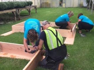 Constructing raised garden bed.