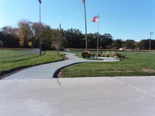 New concrete path in park.