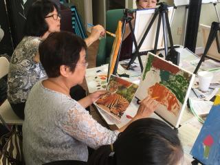 Older adults painting