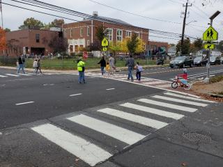 New automatic crossing signal at a crosswalk.