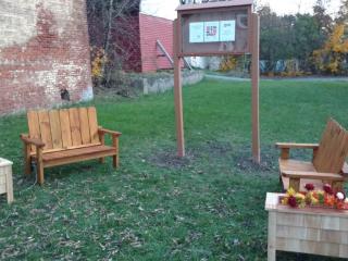New outdoor seating, planters, and bulletin board.