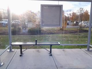Bench in bus shelter.