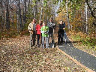Group with completed crushed gravel trail.
