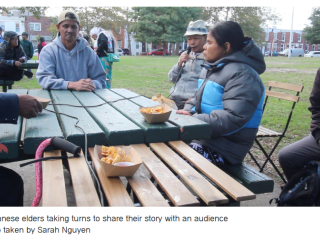 Bhutanese elders sharing stories with audience.