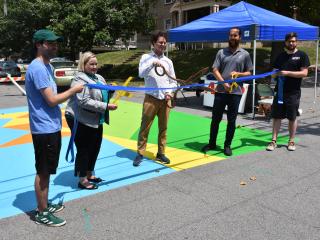 Ribbon cutting for painted intersection.