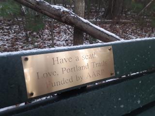 Plaque on bench.