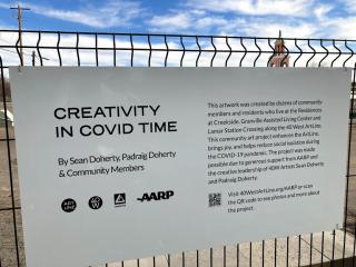 Sign about "Creativity in Covid" art display.