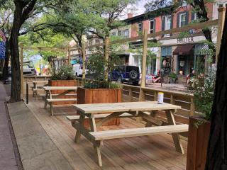 Parklet with tables and planters.