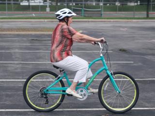 Adult testing bicycle.