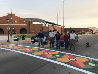 New artistic crosswalk with flower theme and painters.