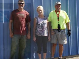 Group in front of Container that will be Tool Lending Library.