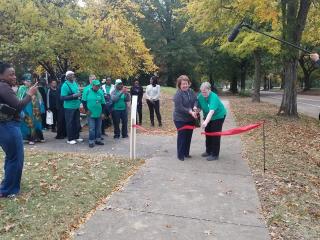 ribbon cutting to new paved trail.
