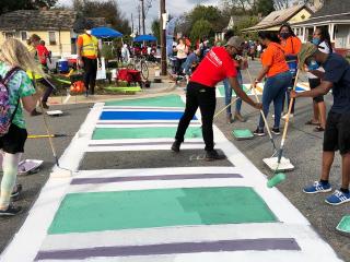 Group painting crosswalk.