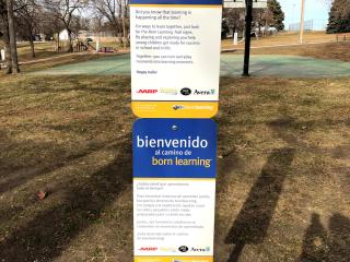 Bilingual sign for the Born Learning Trail.