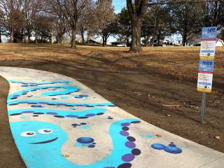 Artistic painted sidewalk  for the Born Learning Trail.
