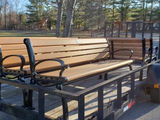 Five benches in trailer ready to be installed.