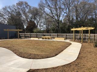 New walking path, bench swings and planters.