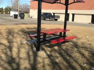 Picnic table with awning.