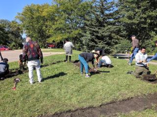 Group preparing planting bed.