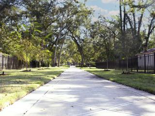 New linear park and paved walking path.