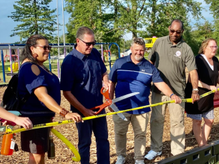 Ribbon cutting event for park.