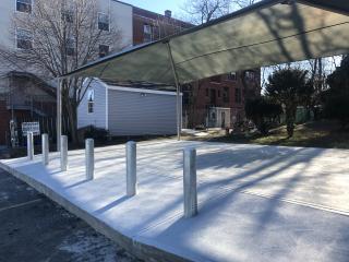 New shaded pavilion and concrete slab.