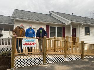 Ramp for Habitat for Humanity home with AARP thank you sign