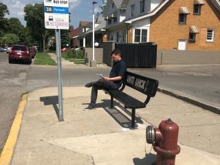 New bench at transit stop.