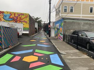 Alley after wall and street murals painted.