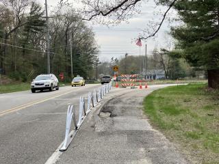 Temporary "wave" delineators installed along bike path.