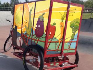 Food delivery bike with mural.