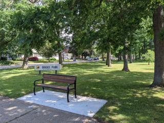 New bench in park.