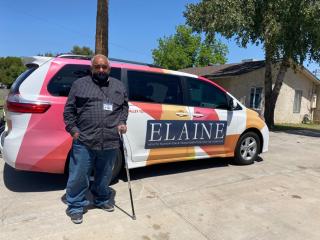An Elaine client with vehicle.