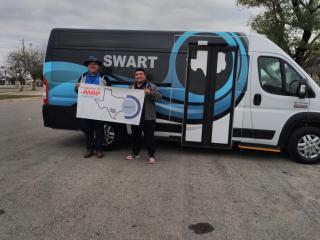 SWART van with AARP sign.