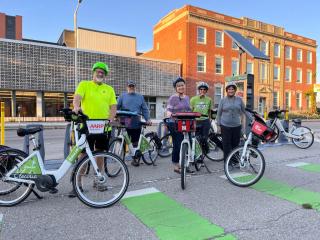 Group using bike share bicycles.