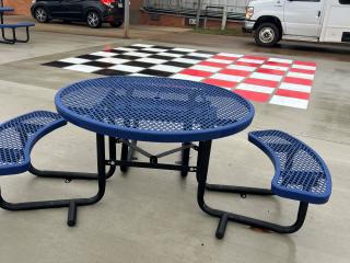 Picnic table and painted large chessboard.