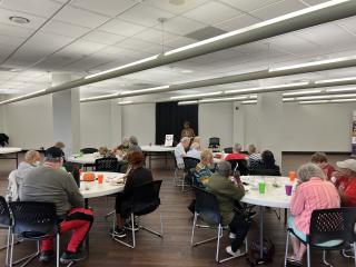 Group of older adults in Lunch-N-Learn.