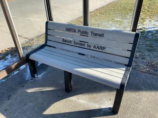 New bench in a bus shelter.
