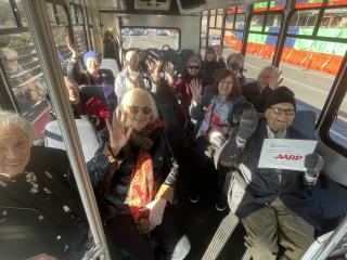 Bus of older adults to Shakespeare.