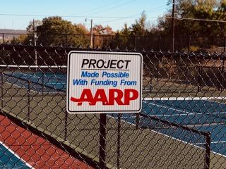 Sign about court renovation project.