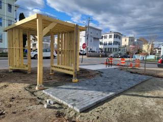 New bike rack, installation of new walkway, and pergola with bench.