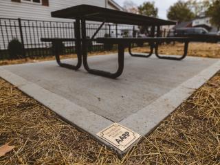 New picnic table in park.
