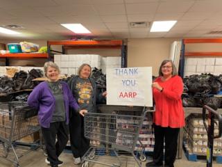 Volunteers with new shopping carts.