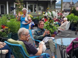 Older adults enjoying garden.