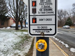 New crosswalk timing signage.