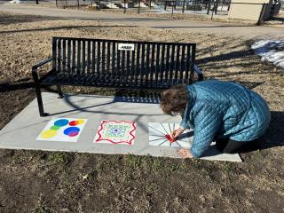 Painting art at base of new bench.