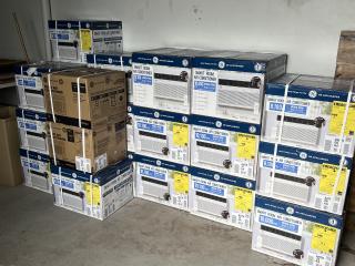A stack of air conditioners to be installed.