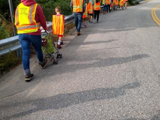 Group in reflective vests conducting walk audit.