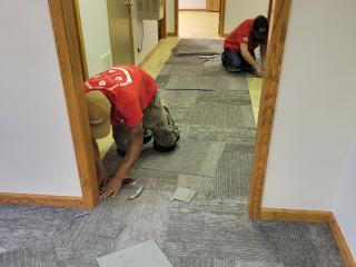 Installing new carpeting in hallway