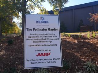 Sign about pollinator garden.